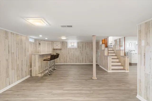 a view of a livingroom with wooden floor