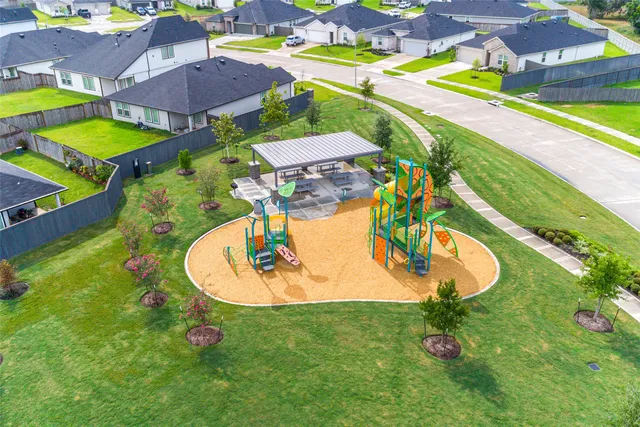 an aerial view of a house with outdoor space pool patio and outdoor seating