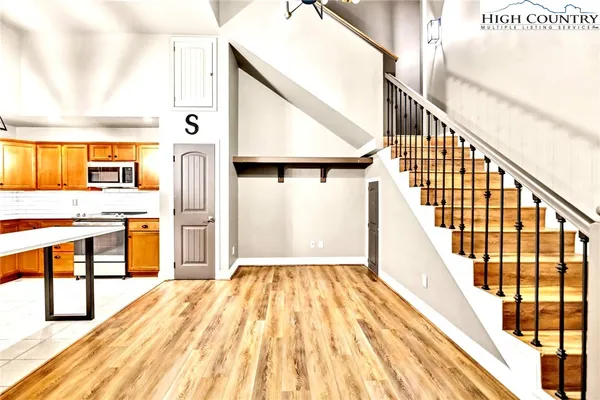 a view of a living room with a balcony