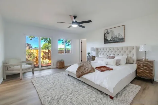 a view of a swimming pool and a yard