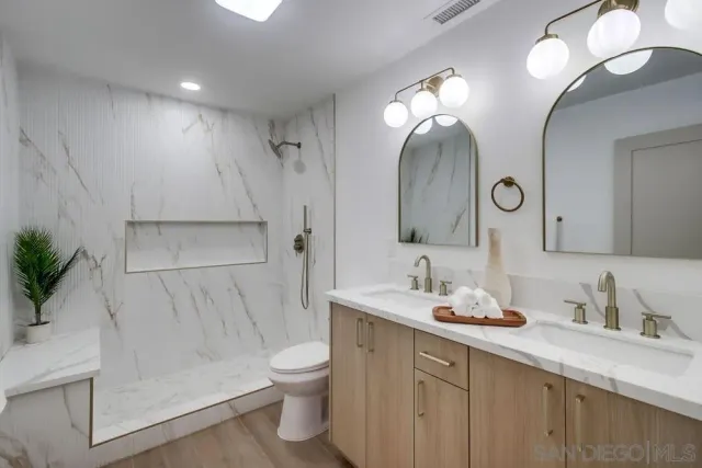 a view of a room with white walls