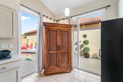a view of elevator with window and wooden floor