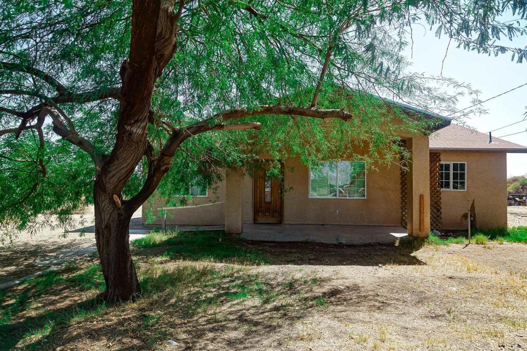 531 Lee Road Imperial, CA 92251 - Photo 2 of 18 a view of a house with backyard and trees