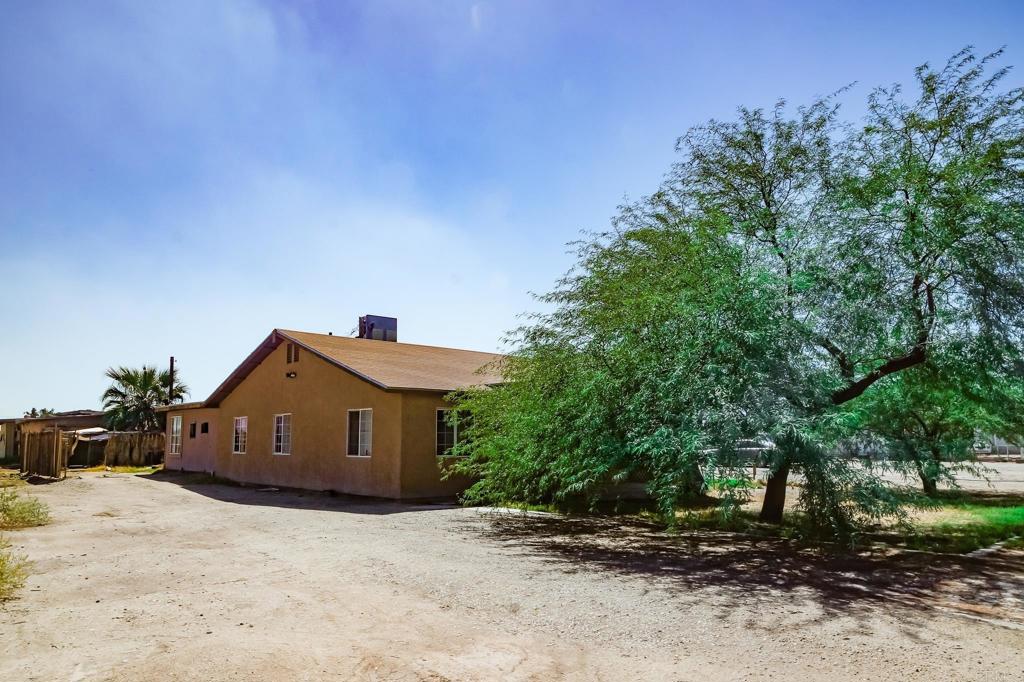 531 Lee Road Imperial, CA 92251 - Photo 3 of 18 a front view of a house with a yard