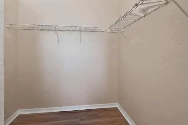 a view of a room with racks on the wall