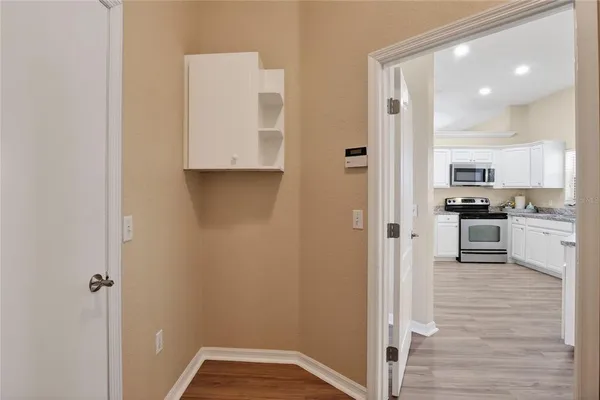 a view of kitchen with wooden floor