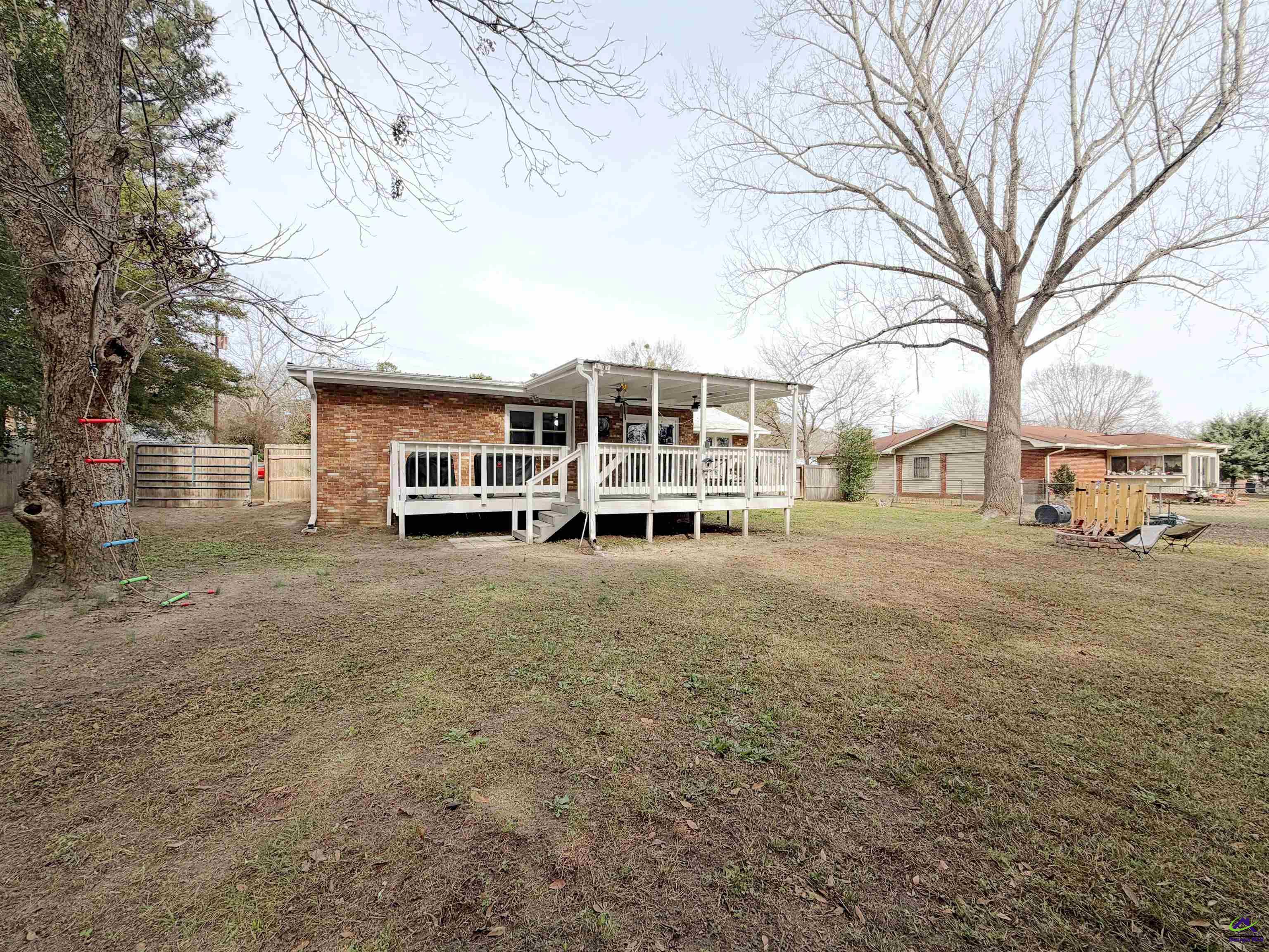 108 Weaver Road Warner Robins, GA 31093 - Photo 23 of 26 a front view of a house with a large tree