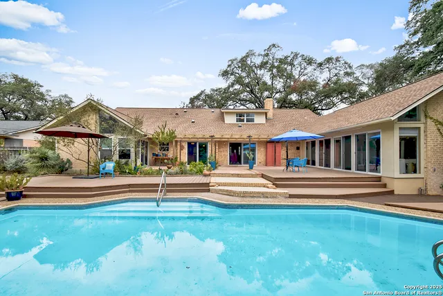 a front view of house with yard and outdoor seating