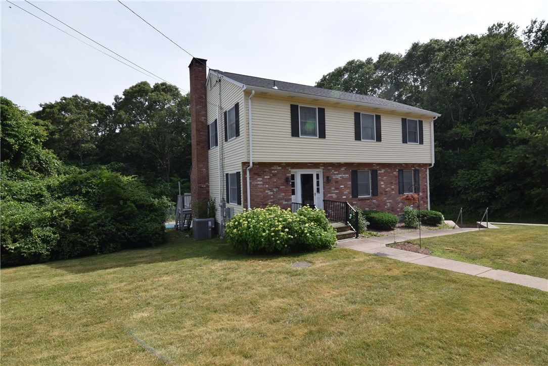 8 Pequot Avenue Westerly, RI 02891 - Photo 1 of 33 A Brick and Vinyl Colonial in established quiet neighborhood, 10 min to beaches, 3 min to downtown, park, library and restaurants.