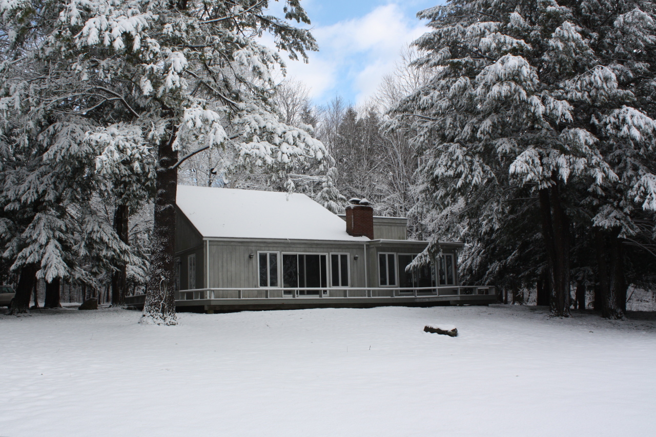 12 Old Tree Farm Road Stockbridge, MA 01266 - Photo 1 of 18 a front view of a house with a yard