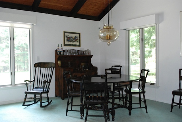 12 Old Tree Farm Road Stockbridge, MA 01266 - Photo 6 of 18 a view of a dining room with furniture window and outside view