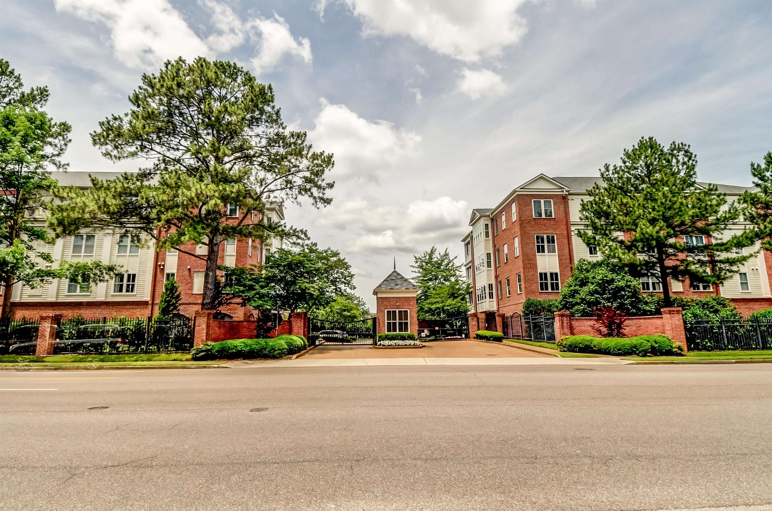 591 Lexington Road, Unit 303 Memphis, TN 38117 - Photo 2 of 34 a view of a street with a cars parked in front of it