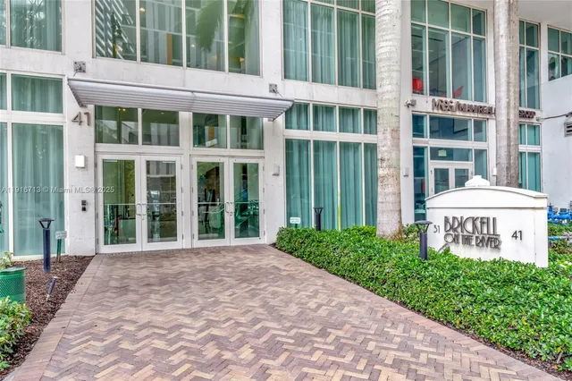 a view of swimming pool with a patio