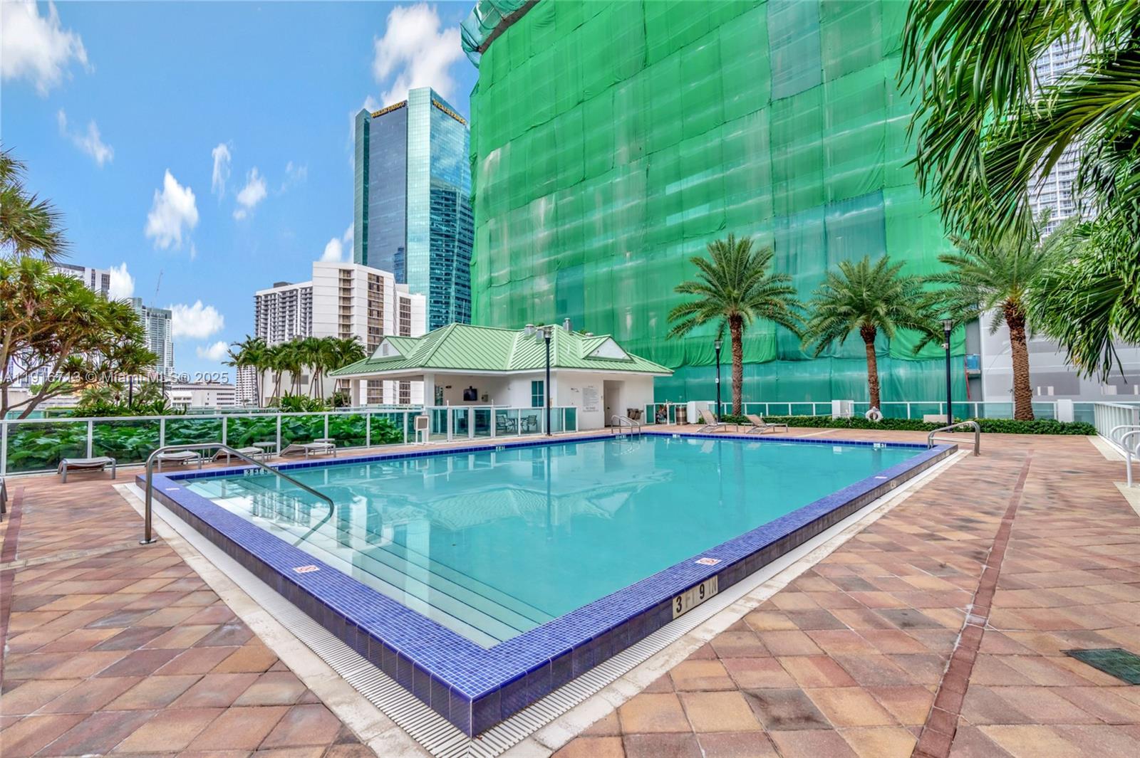 41 Southeast 5th Street, Unit 1212 Miami, FL 33131 - Photo 28 of 37 a view of swimming pool with a patio