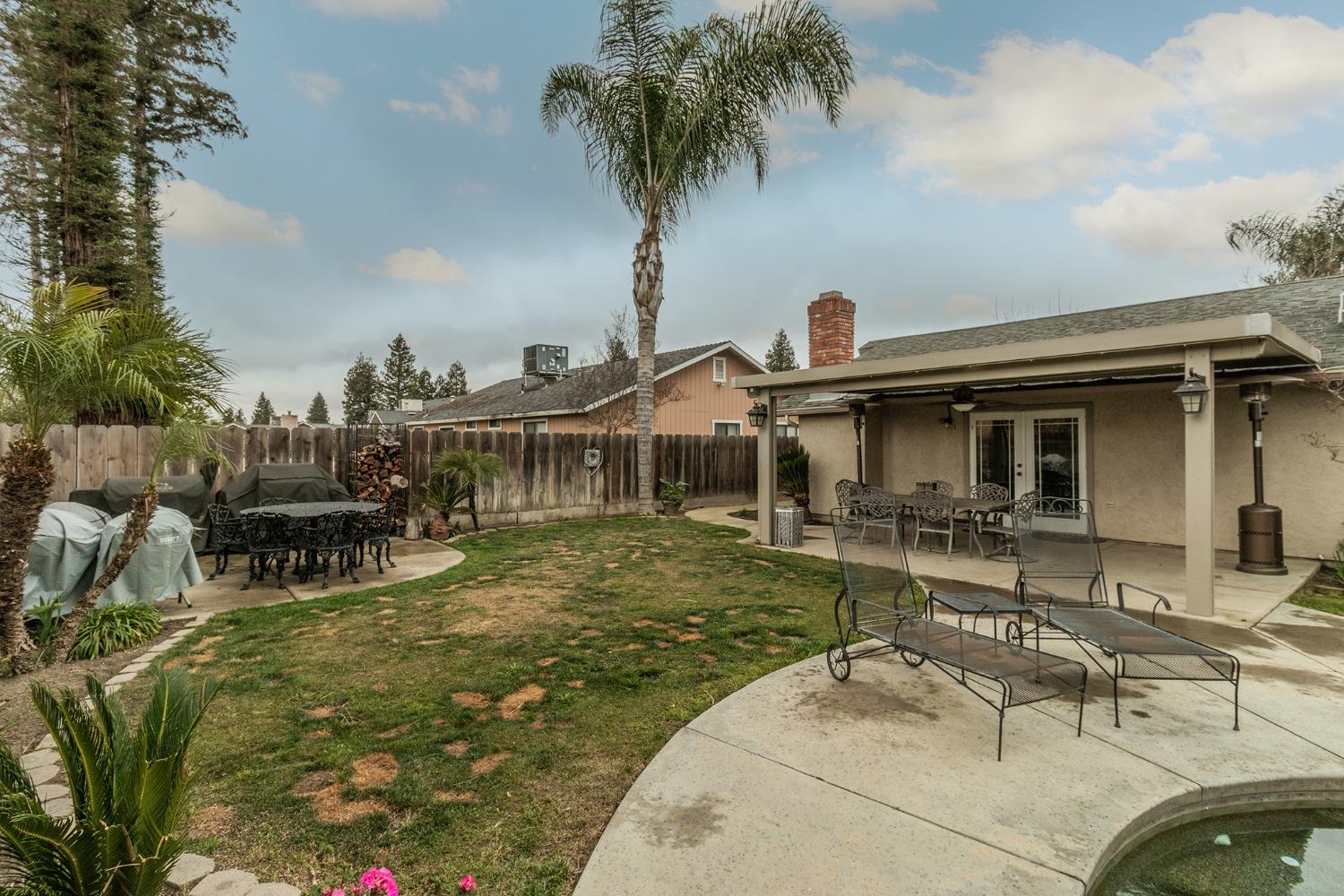 3440 Olive Street Selma, CA 93662 - Photo 20 of 21 a view of a house with backyard porch and sitting area