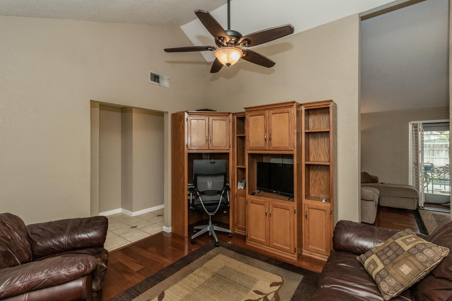 3440 Olive Street Selma, CA 93662 - Photo 10 of 21 a living room with furniture and a flat screen tv