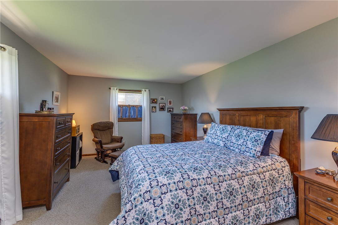 4210 Pleasanton Road Englewood, OH 45322 - Photo 18 of 34 This inviting bedroom provides a comfortable and tranquil retreat for relaxation.