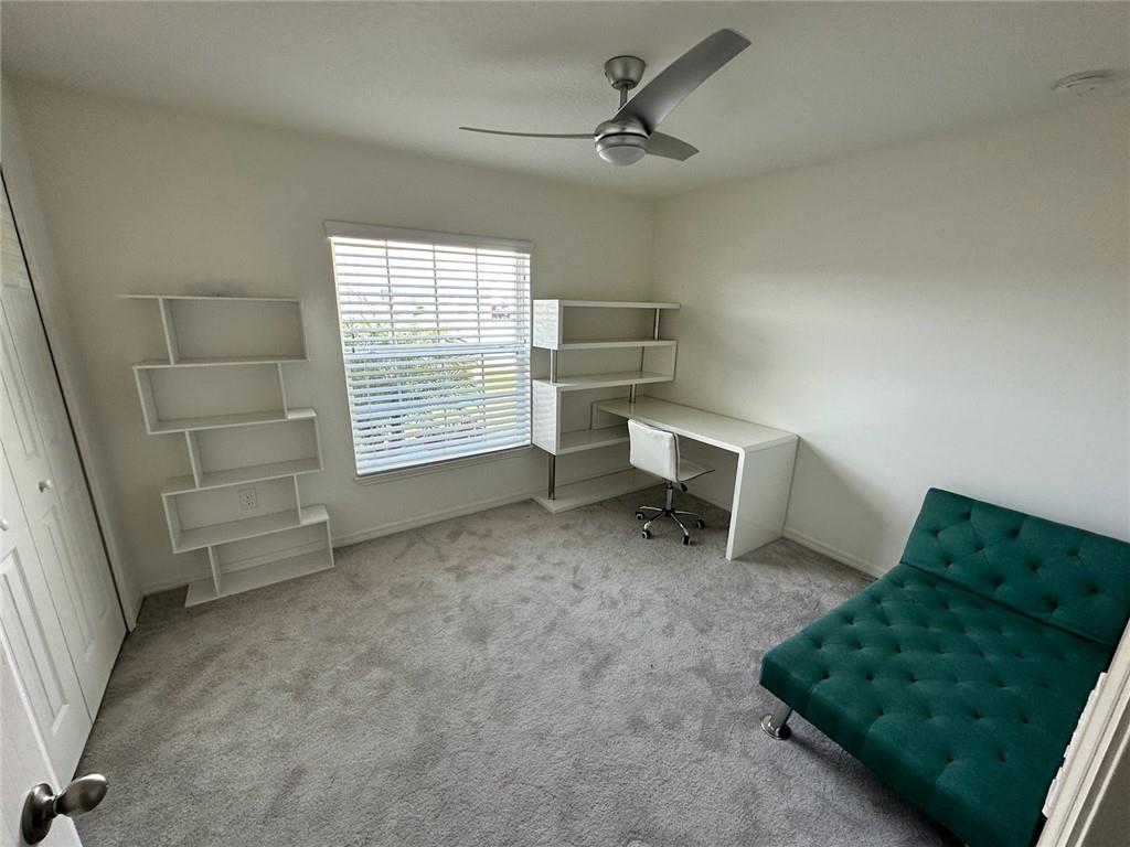 1099 Dania Circle Palm Bay, FL 32905 - Photo 13 of 17 a view of workspace with furniture and windows