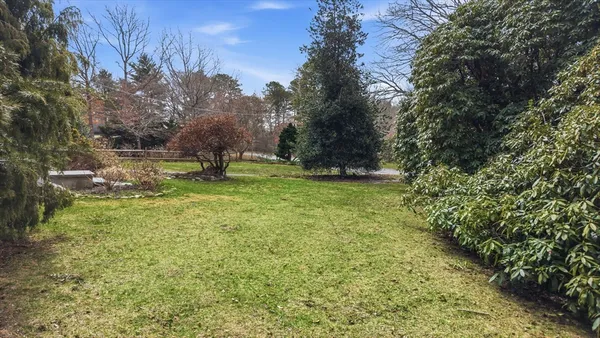 a aerial view of a house with a yard
