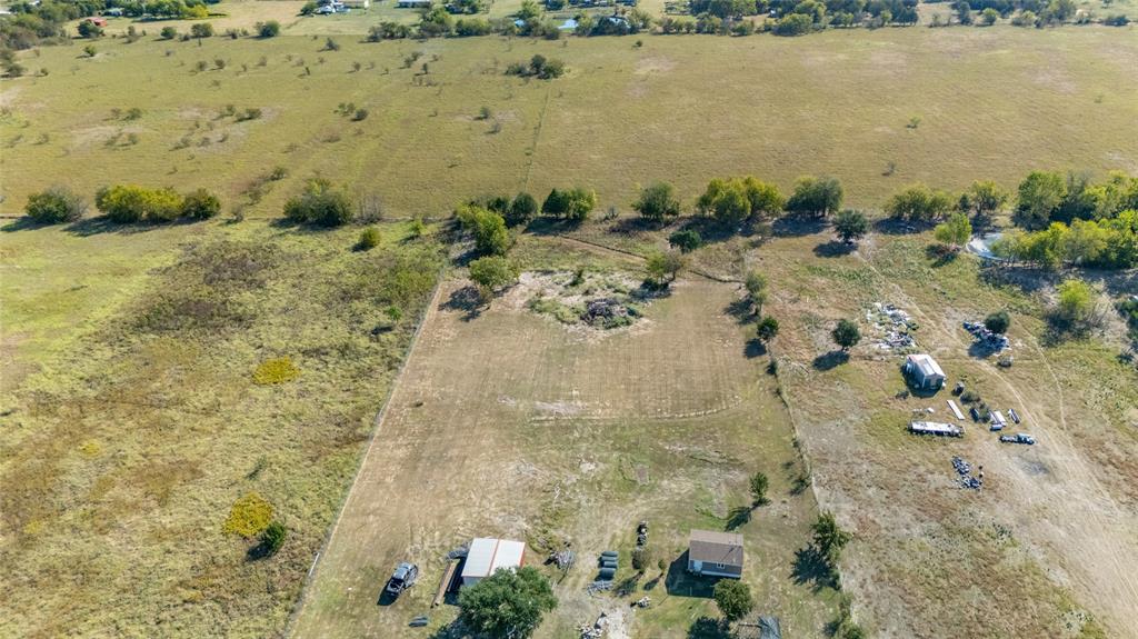 9119 Whiskers Road Quinlan, TX 75474 - Photo 9 of 12 a view of a lake with outdoor space