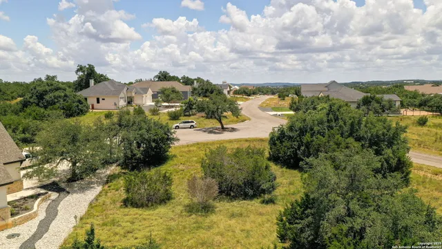 a view of a lake with lots of trees