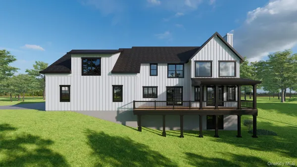 a front view of house with yard and seating area
