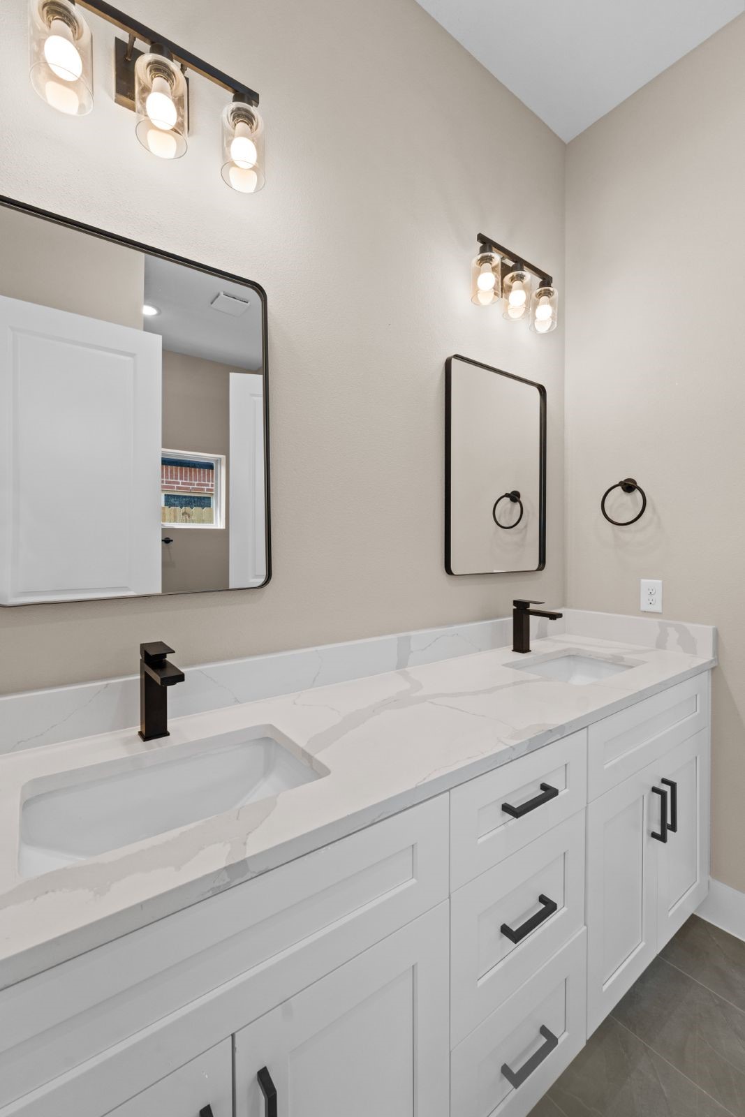 20023 Venetto Street Cir Spring Spring, TX 77388 - Photo 13 of 28 a bathroom with a sink and a mirror