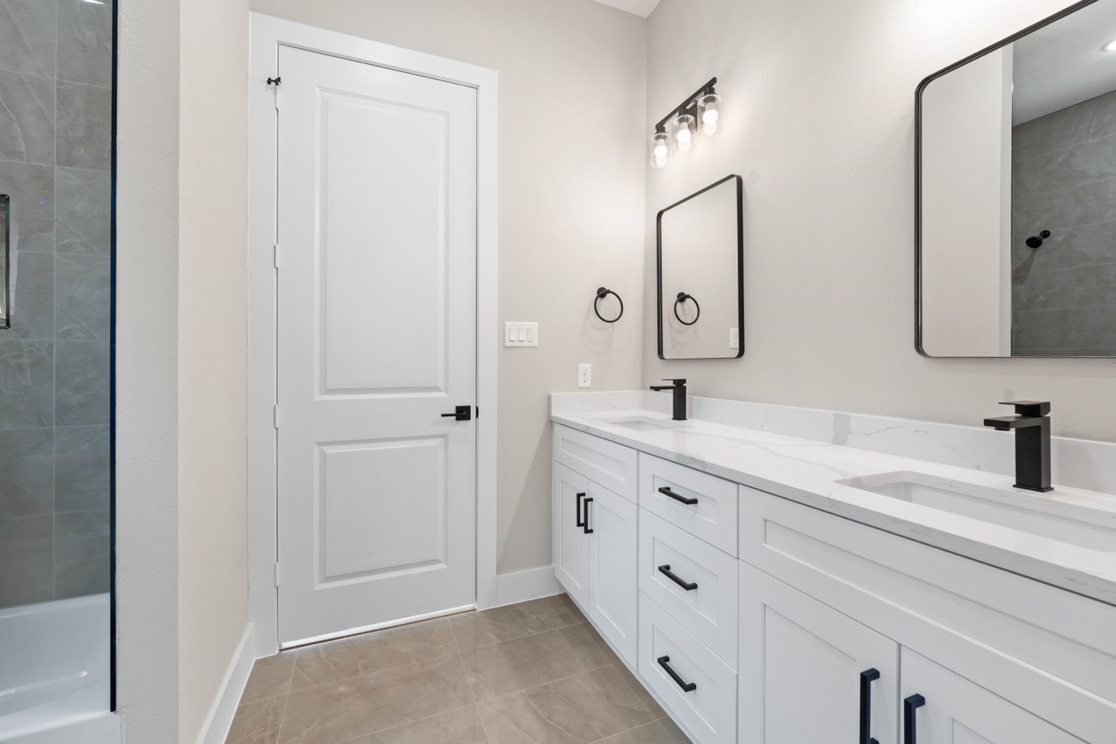 20023 Venetto Street Cir Spring Spring, TX 77388 - Photo 15 of 28 a spacious bathroom with a double vanity sink and mirror