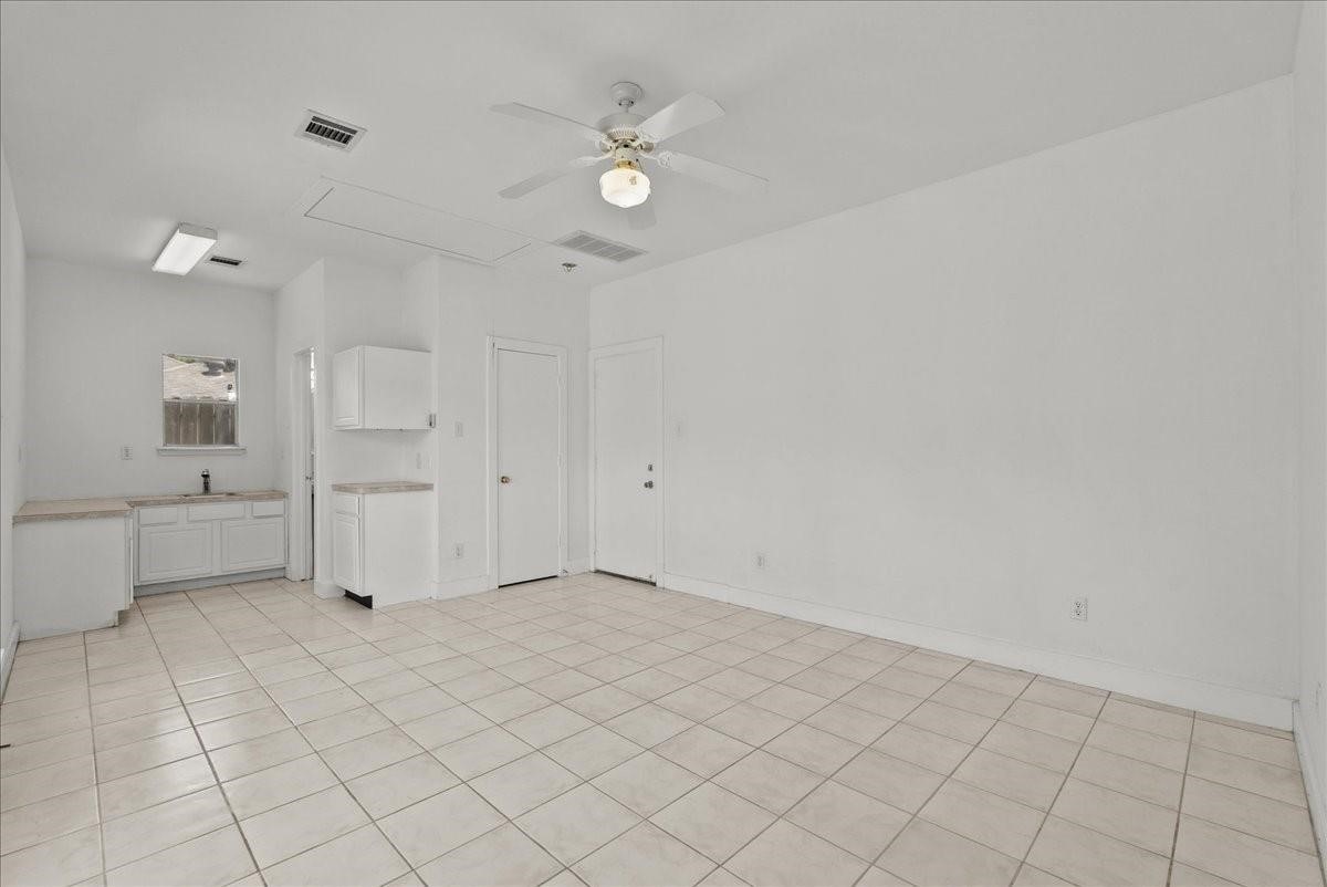 5762 Birdwood Road Houston, TX 77096 - Photo 39 of 49 THIS IS THE STUDIO-STYLED ADU. PERFECT FOR A GAME ROOM, HOME OFFICE, WORKSHOP, CRAFT ROOM, ETC. OR USE AS A LONG TERM RENTAL.