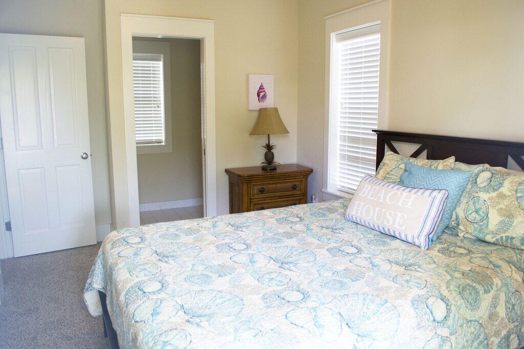 198 Somerset Bridge Road, Unit 129 Santa Rosa Beach, FL 32459 - Photo 14 of 19 a bedroom with a bed and a window