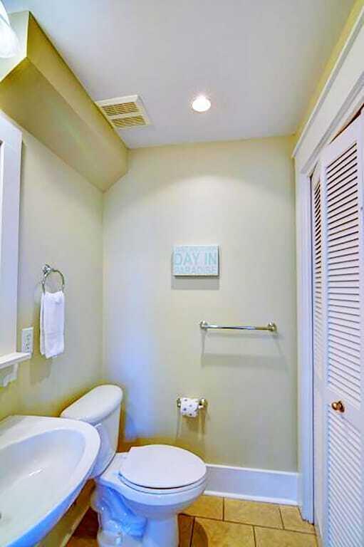 198 Somerset Bridge Road, Unit 129 Santa Rosa Beach, FL 32459 - Photo 17 of 19 a bathroom with a toilet and a shower