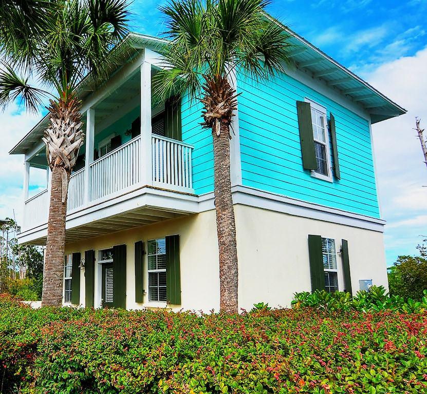 198 Somerset Bridge Road, Unit 129 Santa Rosa Beach, FL 32459 - Photo 3 of 19 a view of a house with a yard
