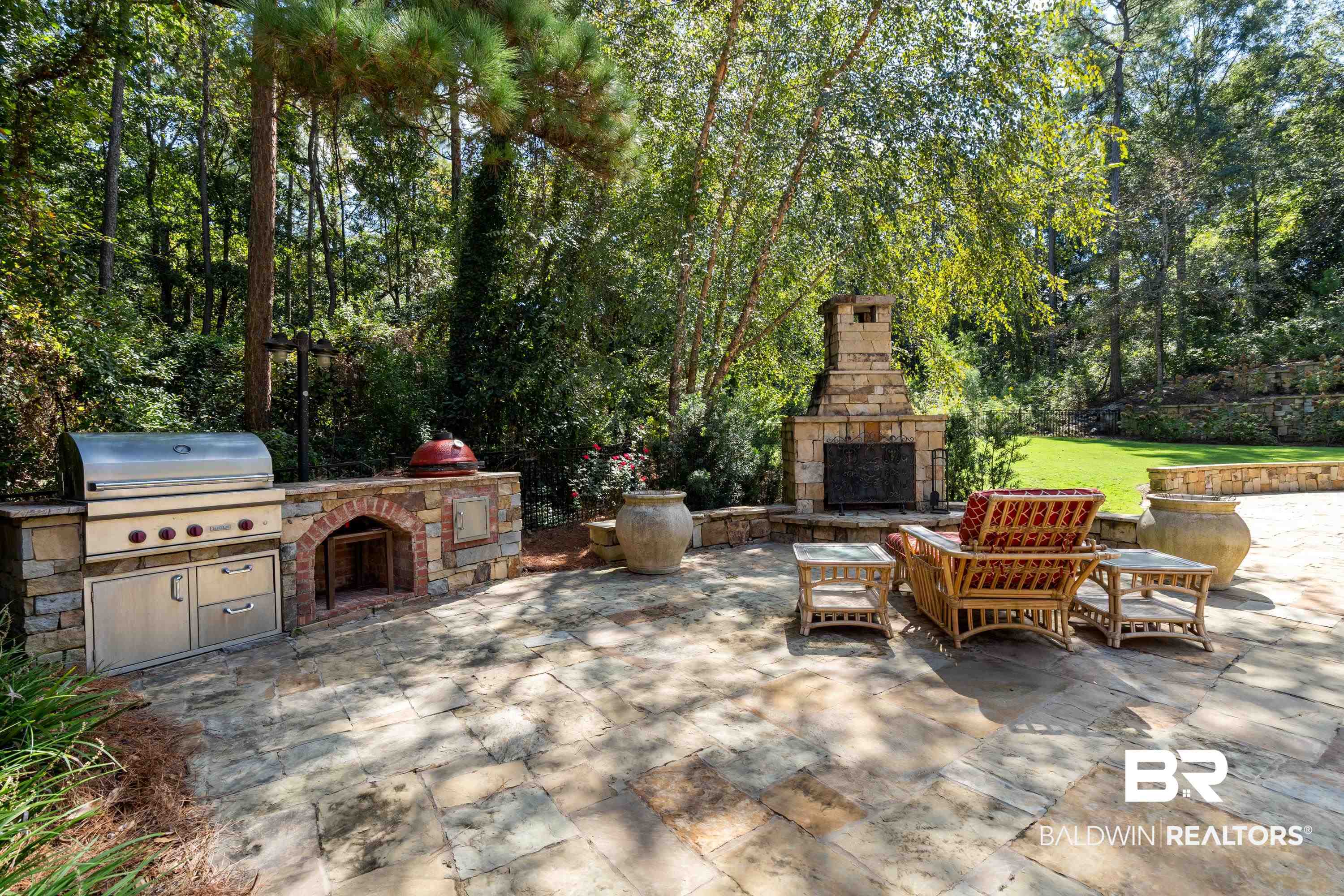 30057 Dolive Ridge Daphne, AL 36527 - Photo 38 of 55 View of patio / terrace featuring grilling area, an outdoor kitchen, and an outdoor stone fireplace