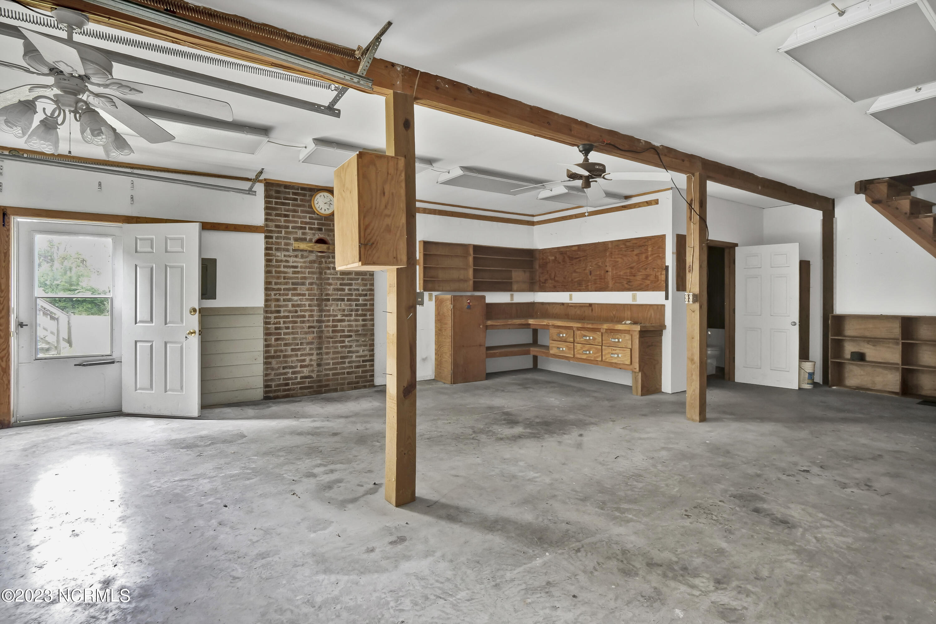 2645 Scotts Hill Loop Road Wilmington, NC 28411 - Photo 21 of 28 Garage with bathroom