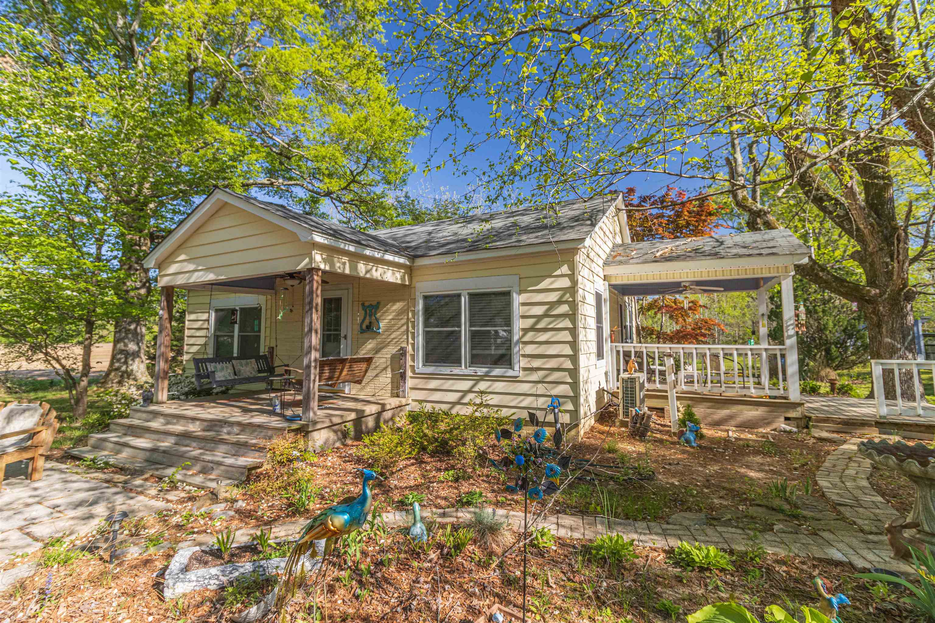 248 Mayflower Road Ramer, TN 38367 - Photo 2 of 31 a front view of a house with garden