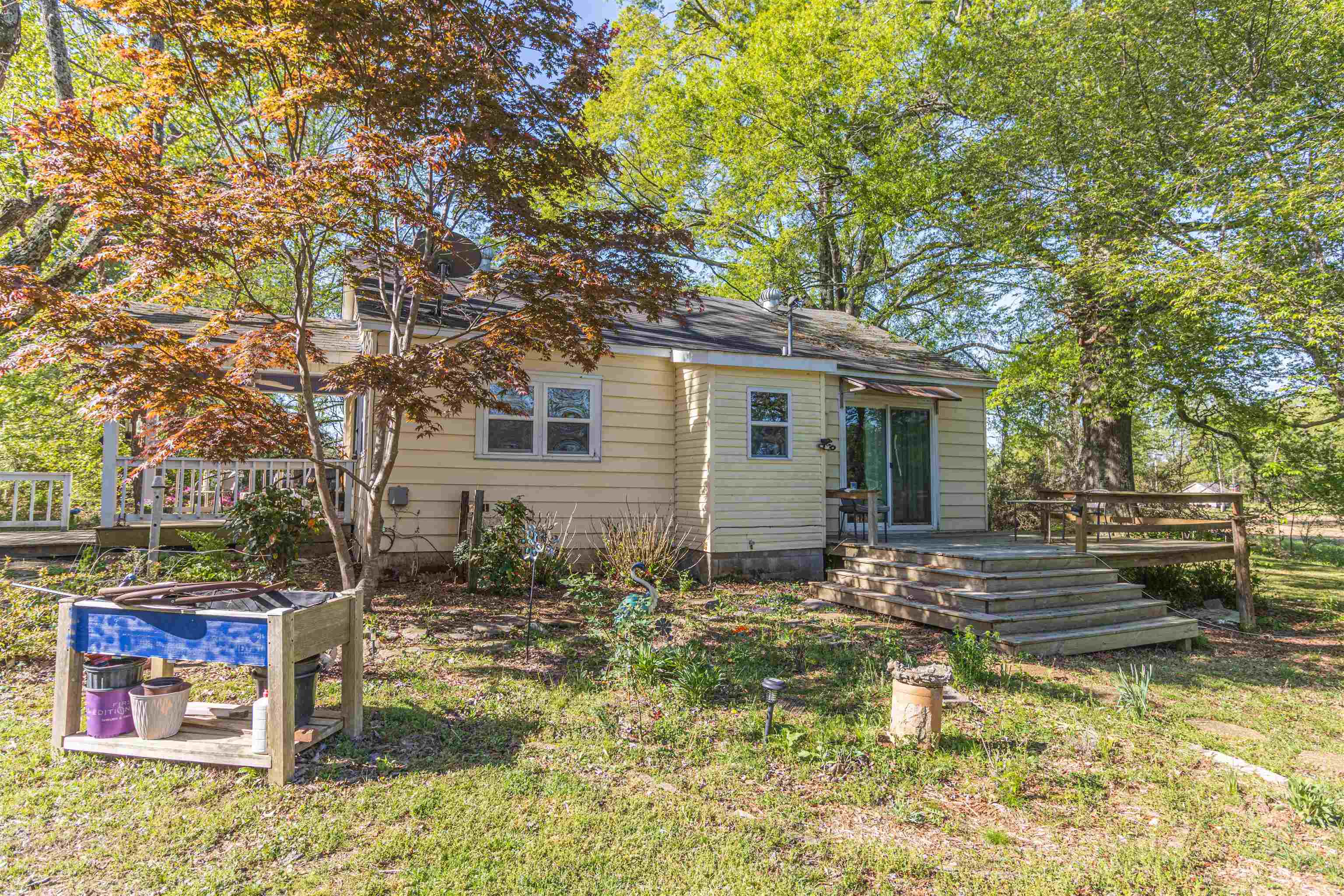 248 Mayflower Road Ramer, TN 38367 - Photo 21 of 31 a view of a house with a yard