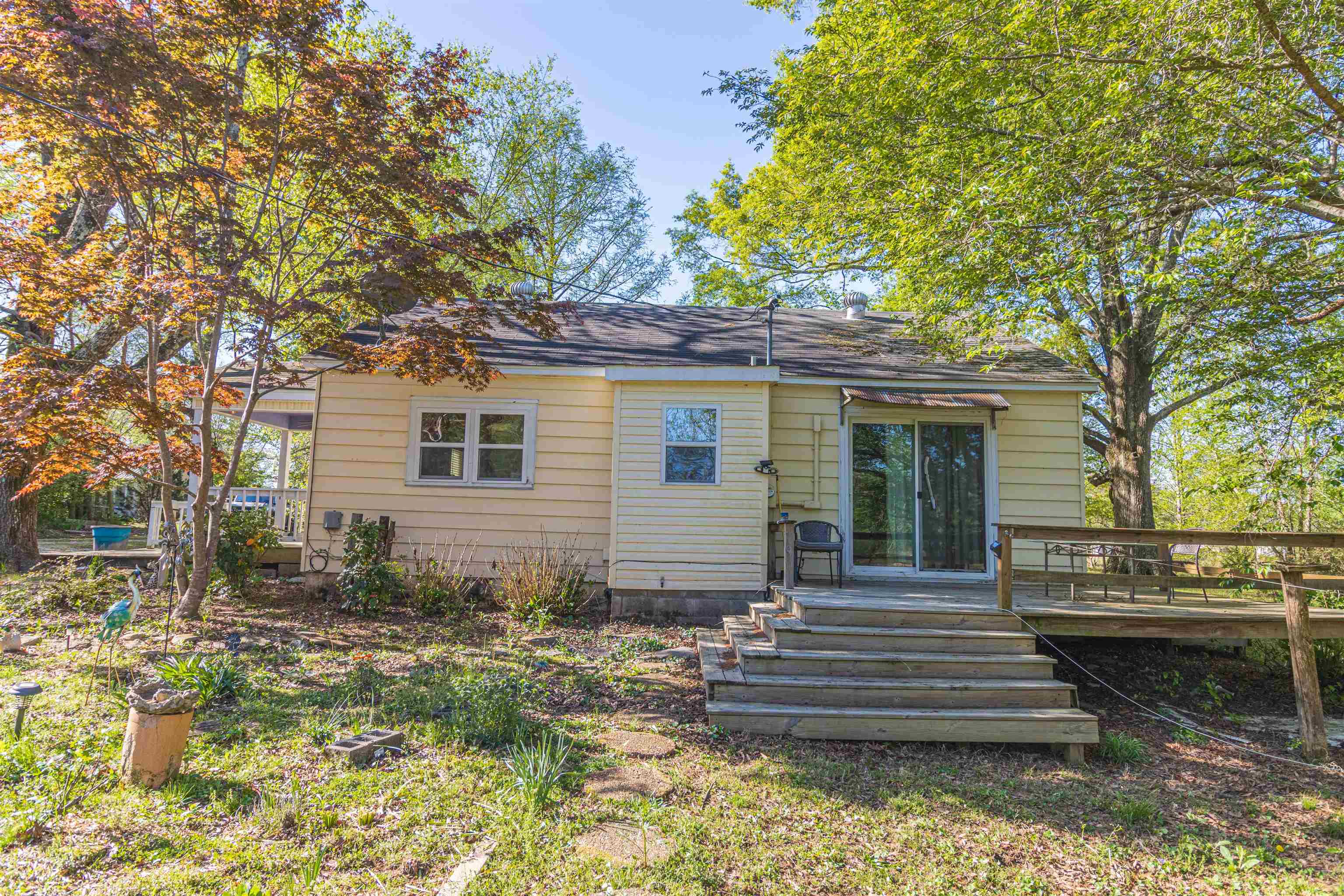 248 Mayflower Road Ramer, TN 38367 - Photo 22 of 31 a front view of a house with a garden