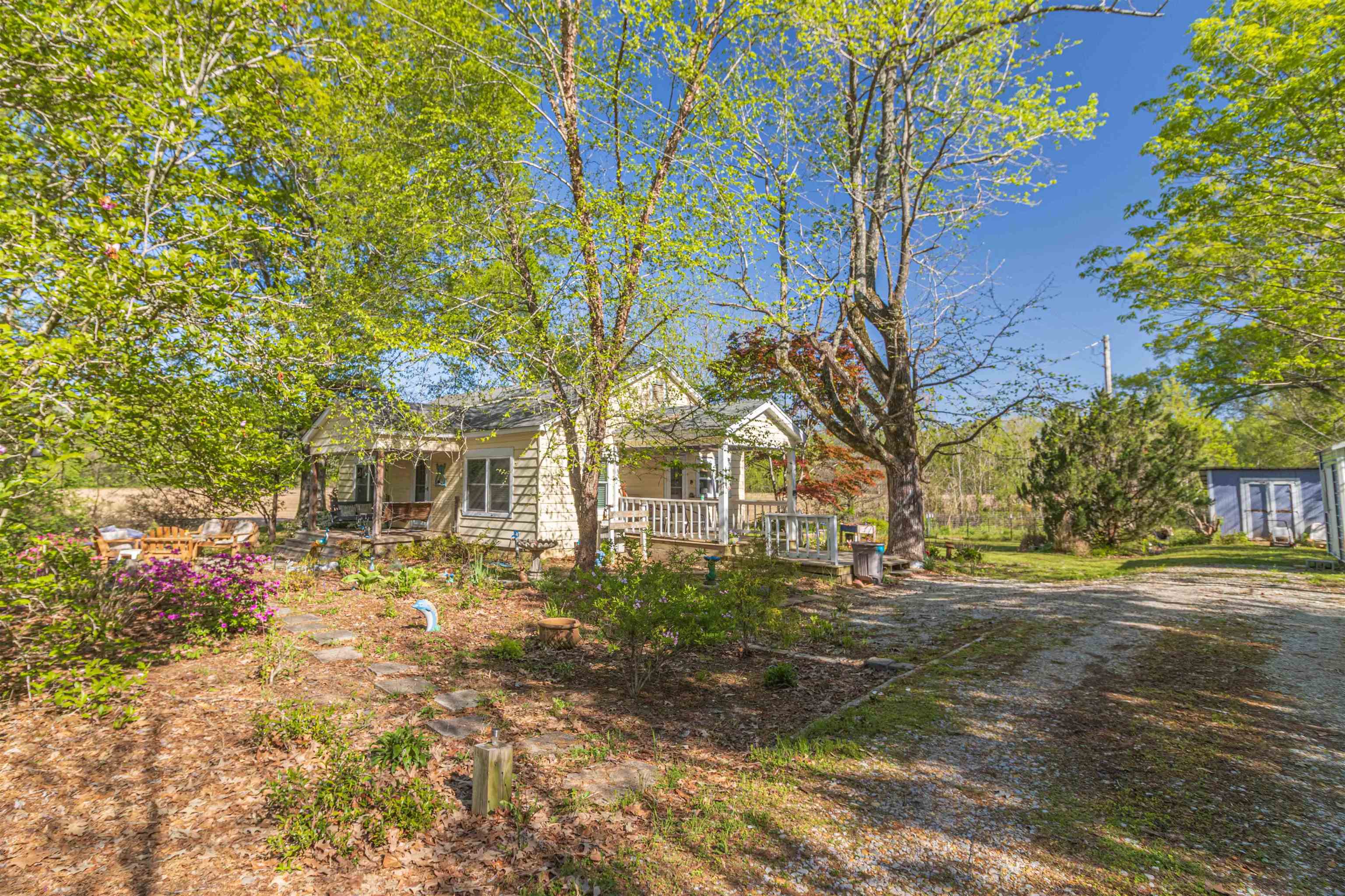 248 Mayflower Road Ramer, TN 38367 - Photo 31 of 31 a front view of a house with a yard