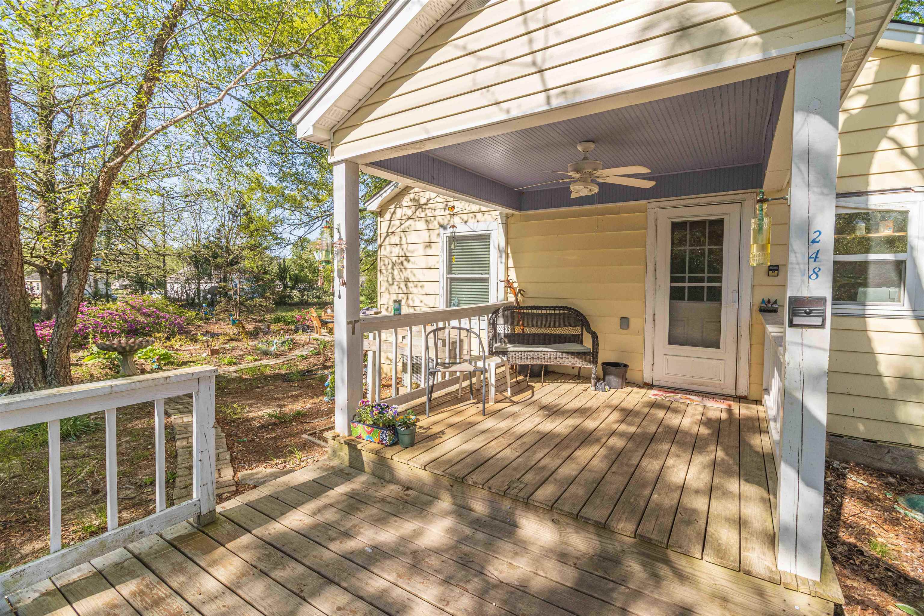 248 Mayflower Road Ramer, TN 38367 - Photo 6 of 31 a view of a house with backyard and sitting area