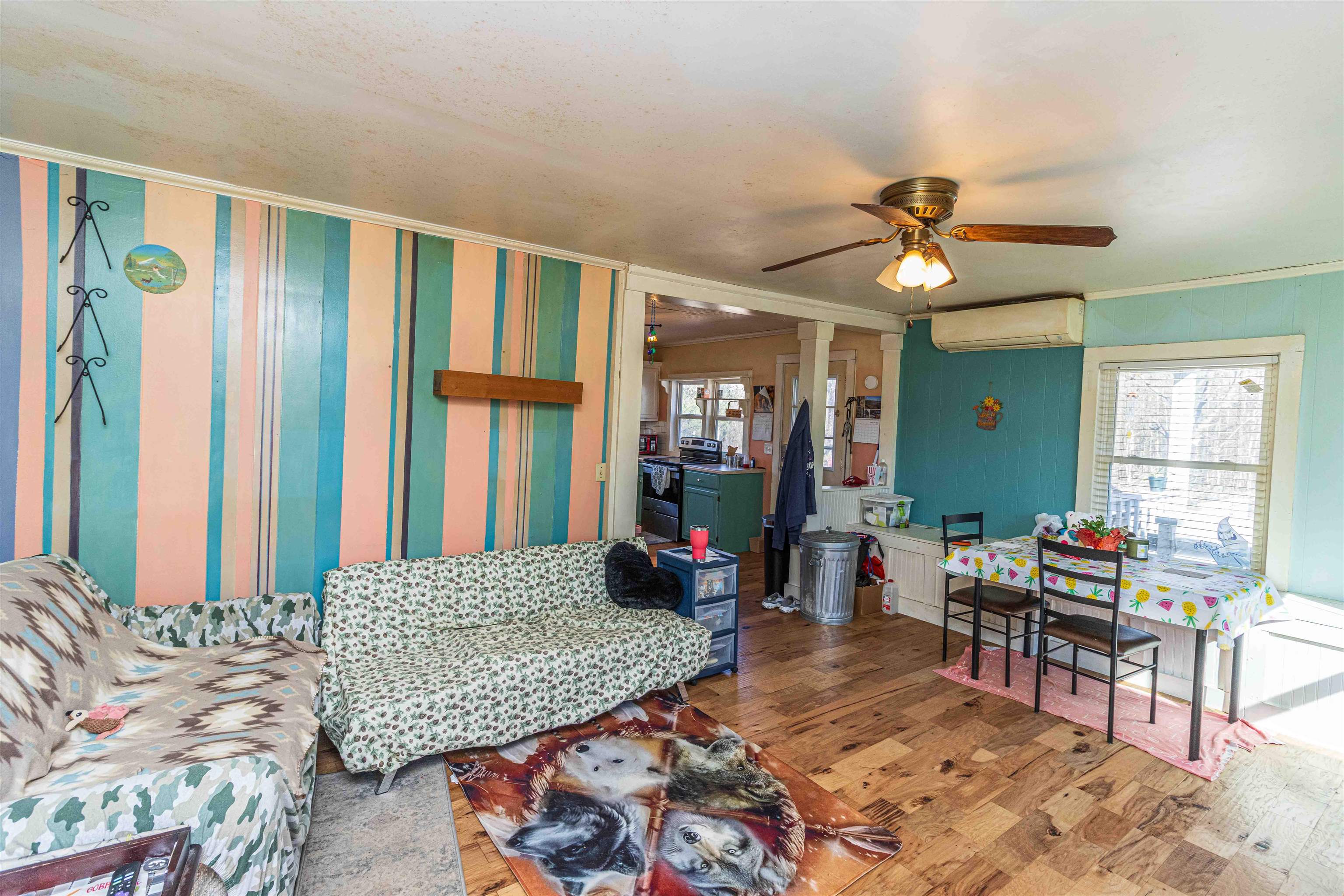 248 Mayflower Road Ramer, TN 38367 - Photo 7 of 31 a living room filled with furniture and a large window