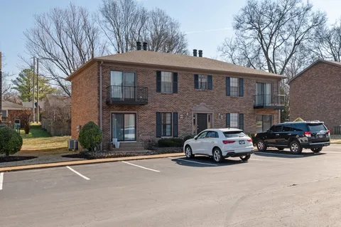 a car parked in front of a house