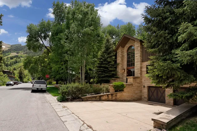 a view of car parked in front of house