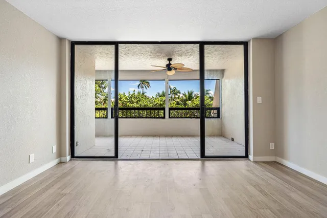 a view of a living room filled with furniture