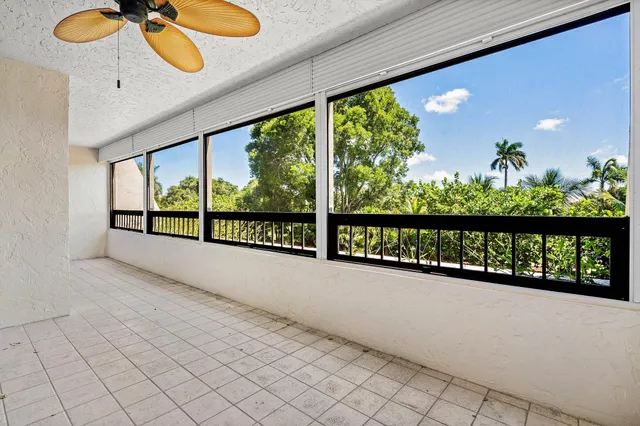 a view of a room with windows