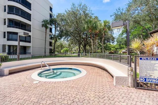 a view of swimming pool with a patio