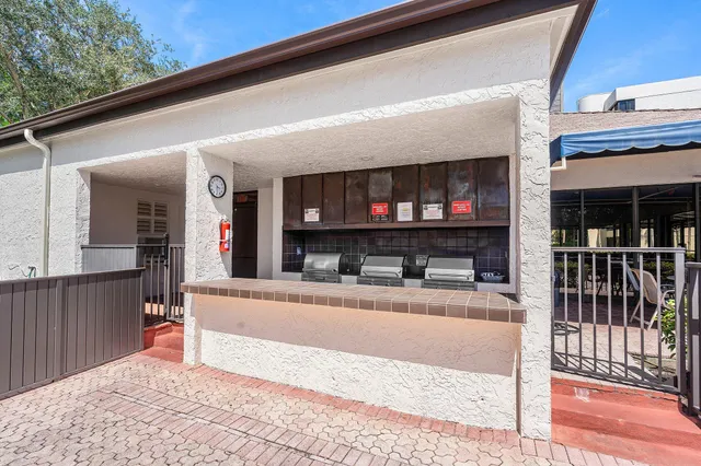 a view of a living room and a balcony