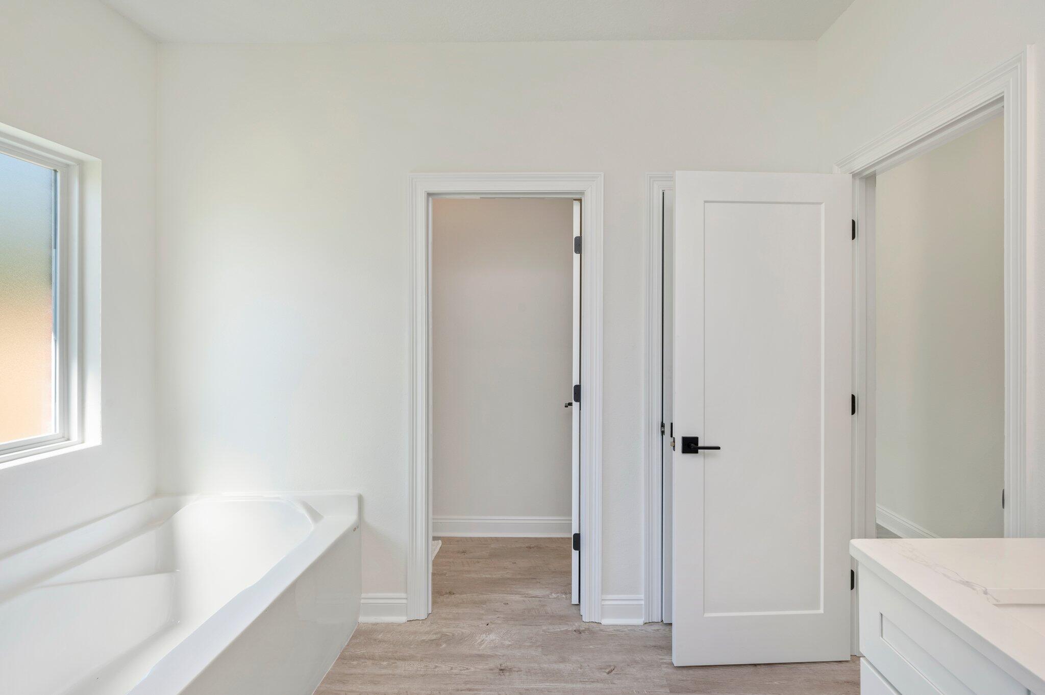 5448 Jenee Court Crestview, FL 32539 - Photo 25 of 42 a bathroom with a bathtub and a sink
