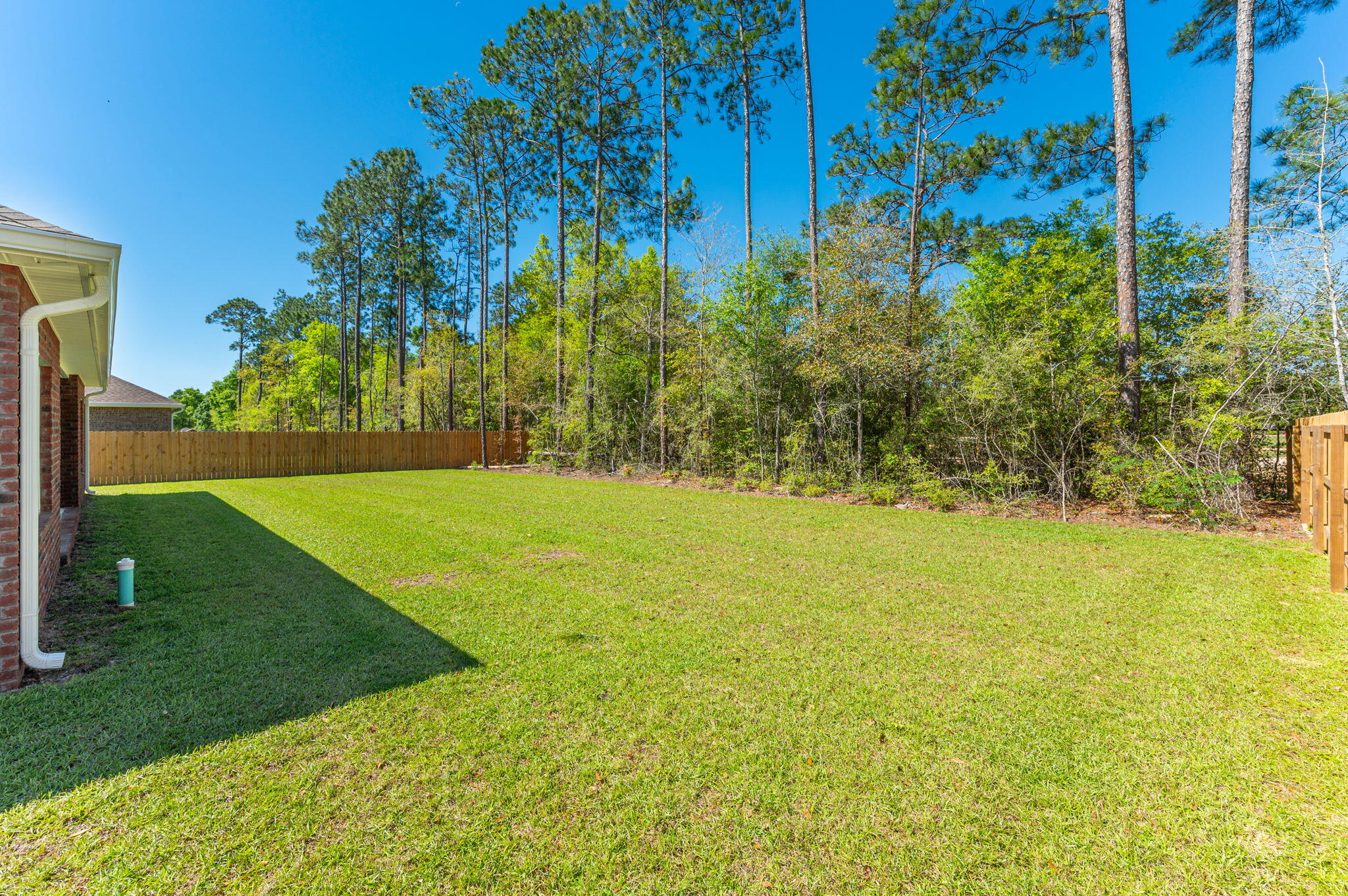 5448 Jenee Court Crestview, FL 32539 - Photo 39 of 42 a view of yard with swimming pool and green space