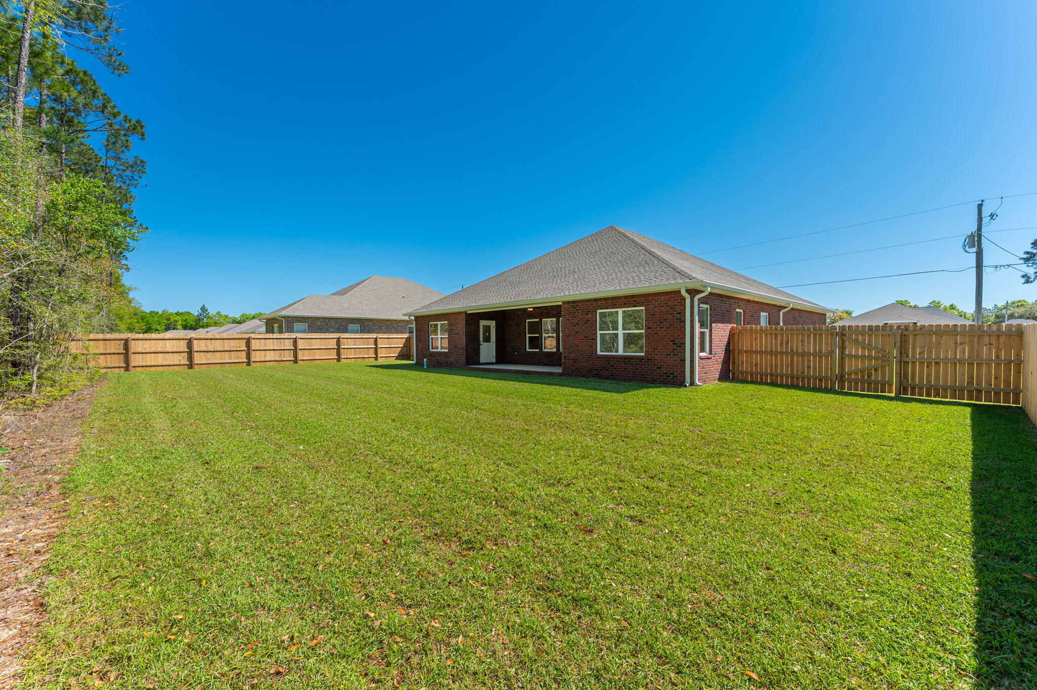 5448 Jenee Court Crestview, FL 32539 - Photo 41 of 42 a front view of a house with garden