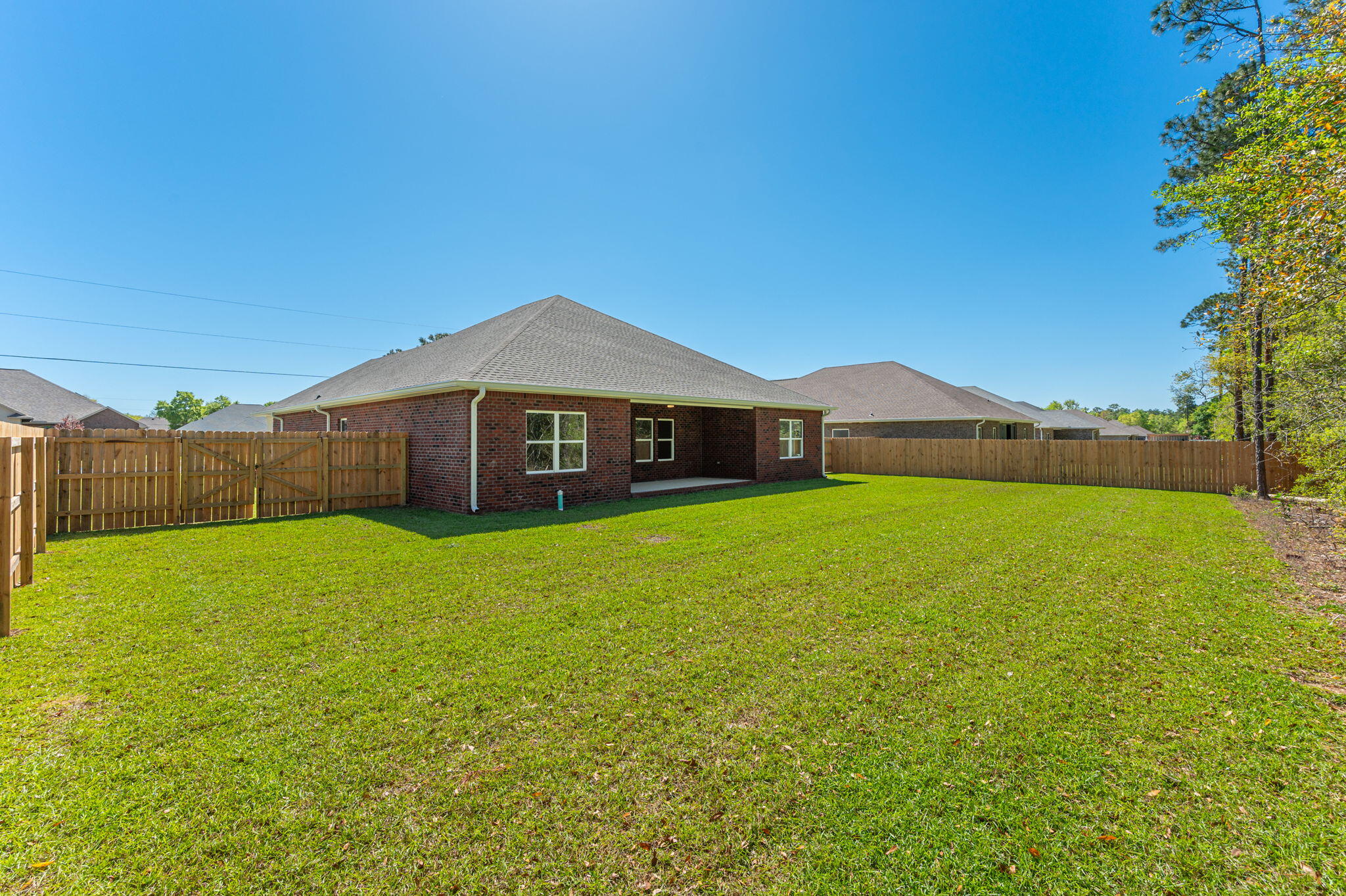 5448 Jenee Court Crestview, FL 32539 - Photo 42 of 42 a front view of house with yard and green space